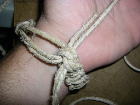 Tie a knot, then double knot it for permanent wearing.  (To take it off and on easy tie a bow tie.)